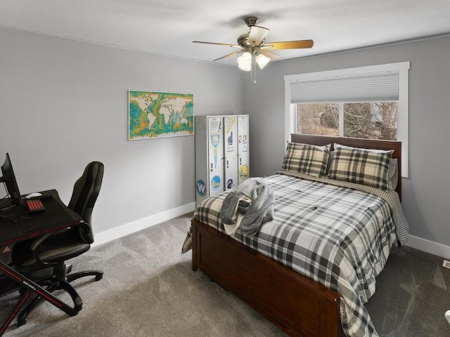 carpeted bedroom with baseboards and ceiling fan