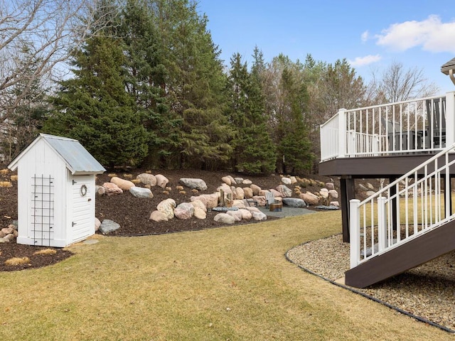 view of yard with a wooden deck