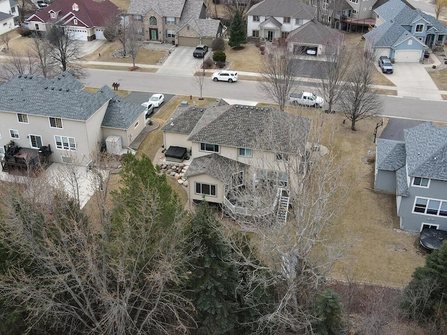 birds eye view of property with a residential view