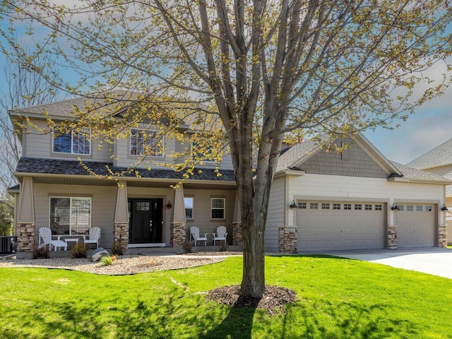 craftsman-style home featuring a front lawn, covered porch, stone siding, and cooling unit