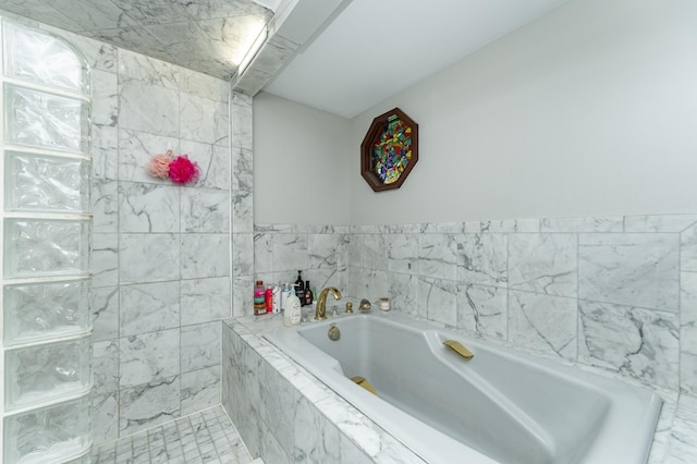 bathroom with a garden tub