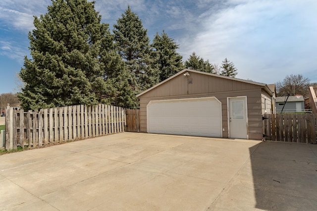 detached garage with fence