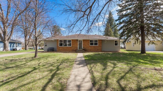 view of front of property with a front lawn