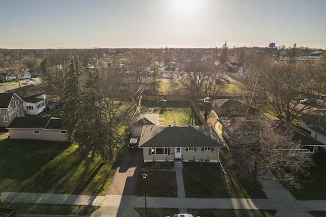 aerial view at dusk with a residential view