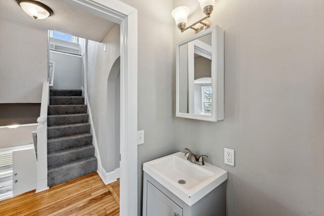 bathroom featuring vanity and wood finished floors