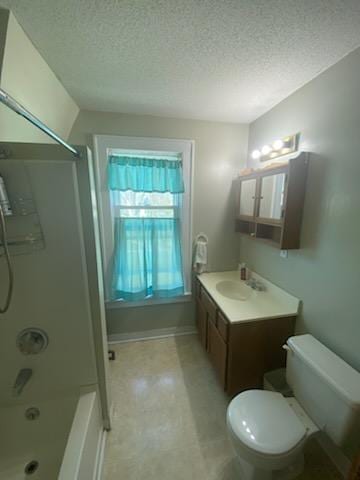 528 Broadway St, Spring Valley, MN 55975 - full bath with  shower combination, a textured ceiling, toilet, and vanity