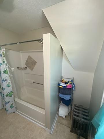 528 Broadway St, Spring Valley, MN 55975 - bathroom featuring tile patterned flooring and shower / bath combo with shower curtain