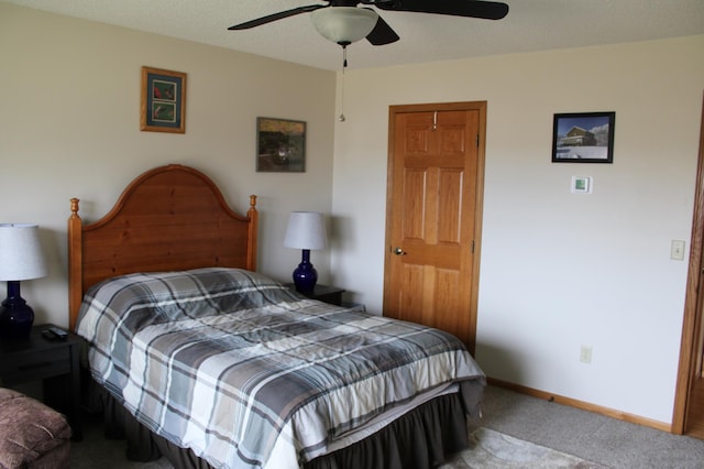 bedroom featuring carpet floors, baseboards, and ceiling fan