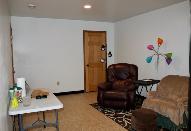 carpeted living room with baseboards and recessed lighting