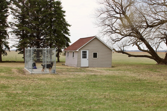 exterior space featuring an outbuilding