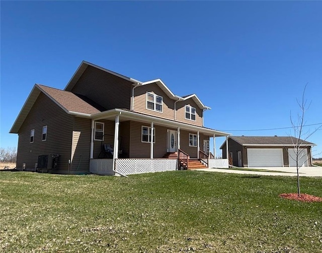 21436 200th Ave NE, Agder Twp, MN 56701 - farmhouse-style home featuring a porch, concrete driveway, a front lawn, an outbuilding, and an attached garage