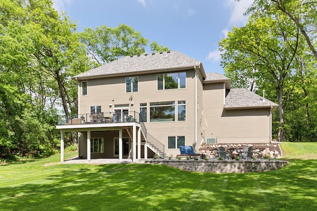 back of house featuring stairway, a deck, a patio, and a yard