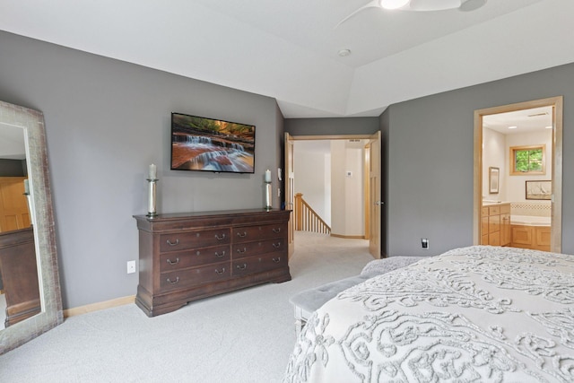 carpeted bedroom with ensuite bathroom