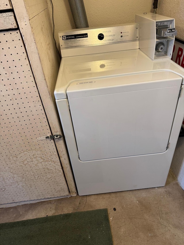 laundry area featuring laundry area and washer / clothes dryer
