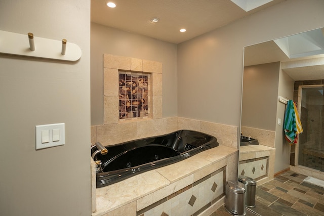 full bathroom featuring a shower stall, recessed lighting, and a whirlpool tub