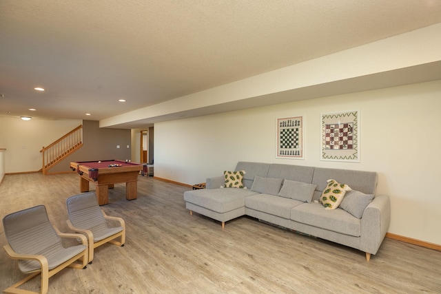 rec room with light wood finished floors, pool table, and baseboards