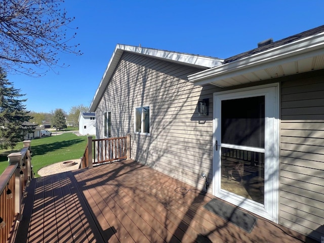 deck featuring a lawn