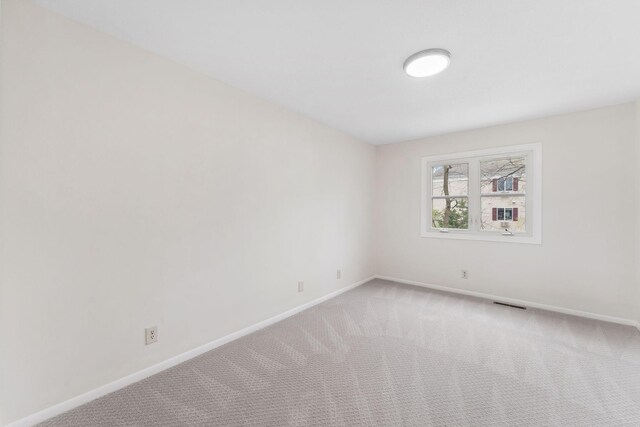 304 Lakeview Ave, Long Lake, MN 55356 - unfurnished room featuring light colored carpet, baseboards, and visible vents