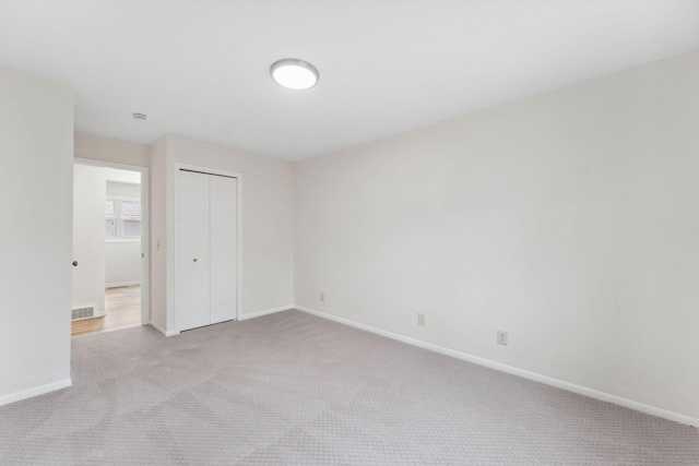 304 Lakeview Ave, Long Lake, MN 55356 - unfurnished room featuring baseboards, visible vents, and carpet floors