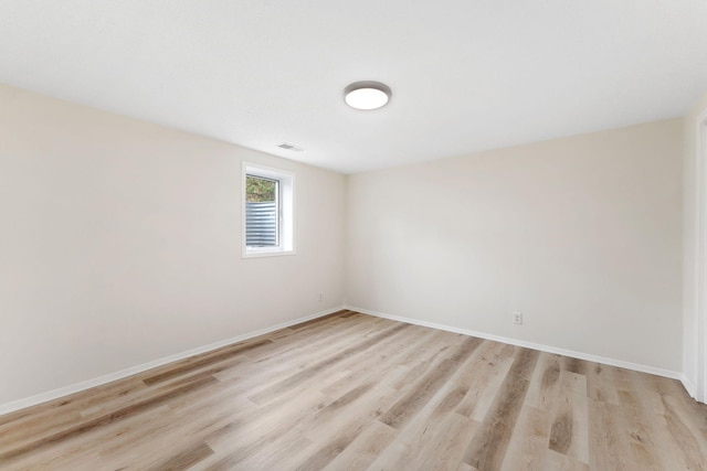 304 Lakeview Ave, Long Lake, MN 55356 - empty room featuring baseboards, light wood finished floors, and visible vents
