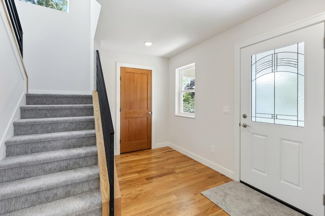 5345 45th Ave S, Minneapolis, MN 55417 - foyer entrance with stairway, light wood finished floors, and recessed lighting
