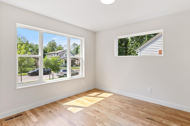 5345 45th Ave S, Minneapolis, MN 55417 - empty room with baseboards and wood finished floors