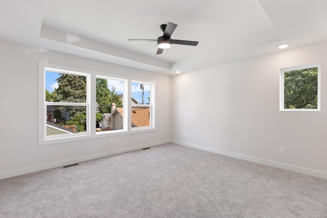 5345 45th Ave S, Minneapolis, MN 55417 - spare room with a raised ceiling, recessed lighting, carpet, and a ceiling fan