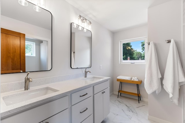 5345 45th Ave S, Minneapolis, MN 55417 - full bath featuring marble finish flooring, plenty of natural light, and double vanity