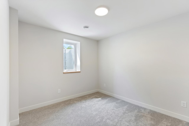 5345 45th Ave S, Minneapolis, MN 55417 - empty room featuring light carpet and a smoke detector