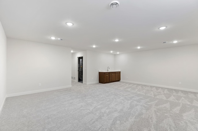 5345 45th Ave S, Minneapolis, MN 55417 - below grade area with light colored carpet, wet bar, and recessed lighting
