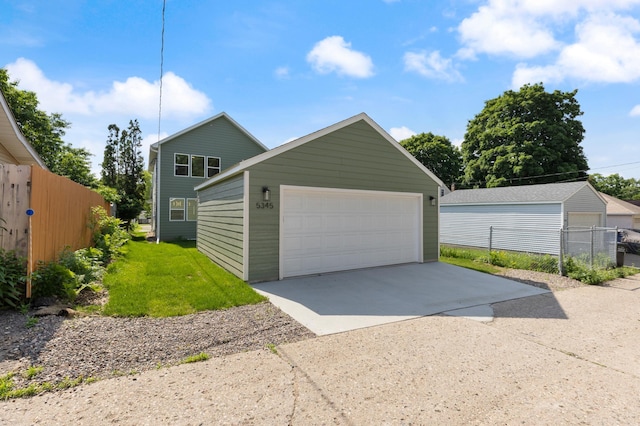 5345 45th Ave S, Minneapolis, MN 55417 - view of front of home featuring an outbuilding and a garage