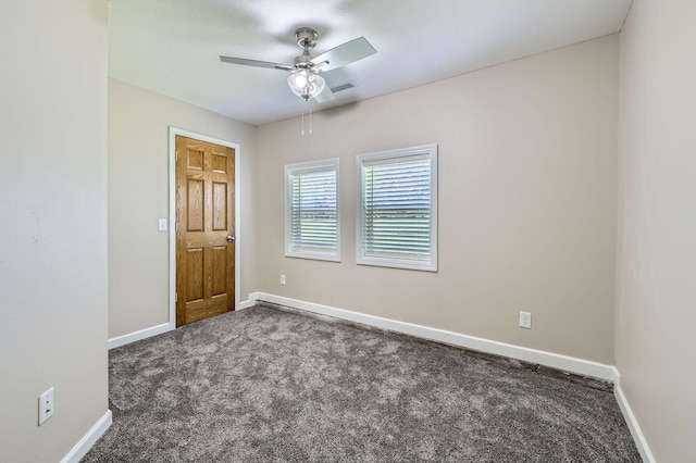 5159 Fawn Lake Dr NE, Linwood Twp, MN 55079 - empty room featuring carpet floors, ceiling fan, and baseboards