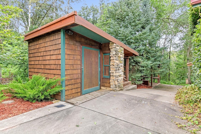 view of outbuilding with an outdoor structure