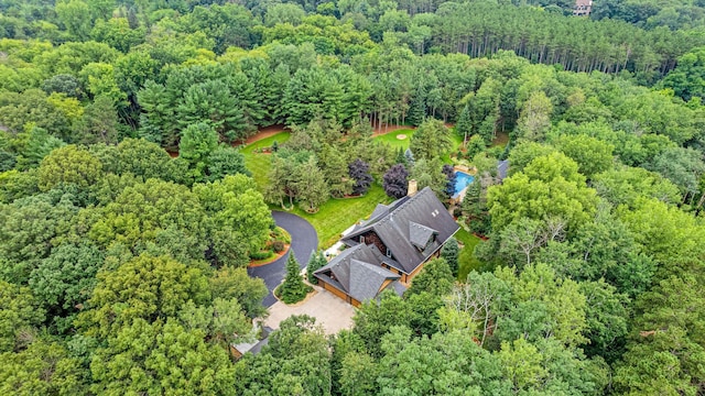 drone / aerial view with a forest view