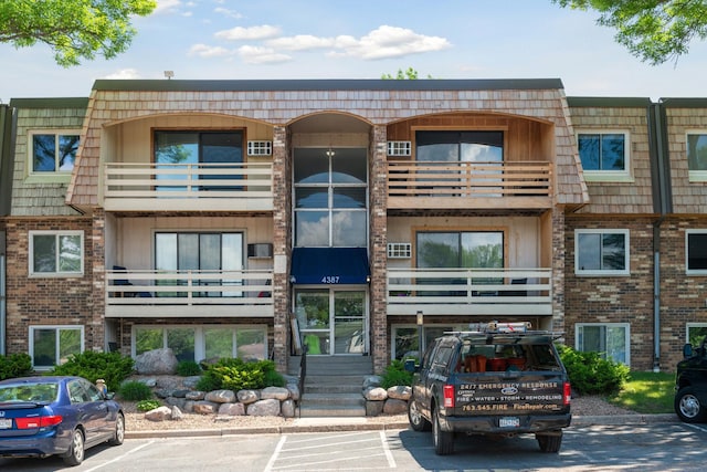 4387 Wilshire Blvd Unit 202, Mound, MN 55364 - view of property with uncovered parking