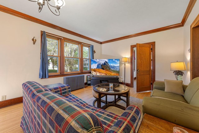 205 2nd St SW, Blooming Prairie, MN 55917 - living room featuring radiator, light wood-type flooring, a chandelier, crown molding, and baseboards