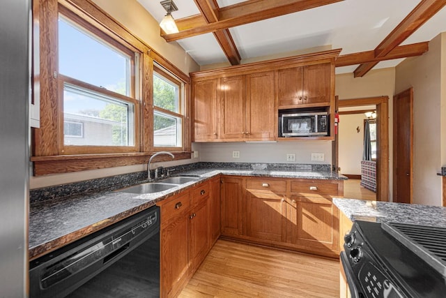 205 2nd St SW, Blooming Prairie, MN 55917 - kitchen featuring black appliances, a sink, light wood-type flooring, beam ceiling, and brown cabinets