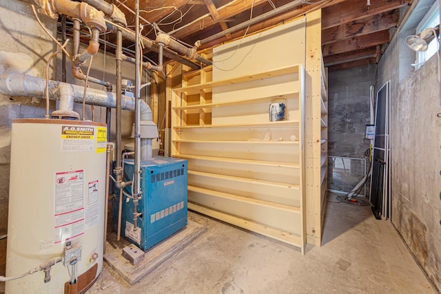 205 2nd St SW, Blooming Prairie, MN 55917 - utility room with gas water heater and a heating unit