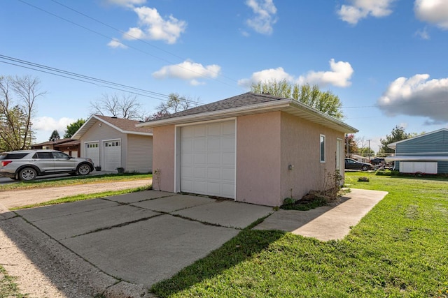 205 2nd St SW, Blooming Prairie, MN 55917 - detached garage with concrete driveway