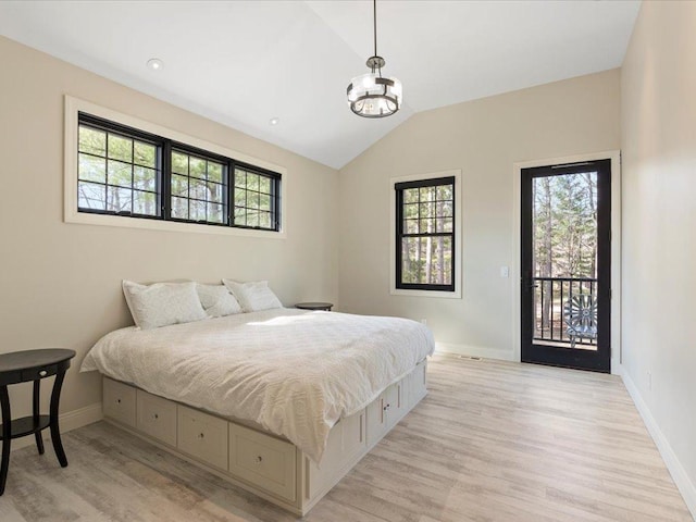 bedroom featuring lofted ceiling, light wood-type flooring, access to exterior, baseboards, and a chandelier