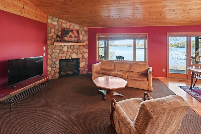 10209 Amery Ave NW, Silver Creek Twp, MN 55362 - living area with vaulted ceiling, a fireplace, wood ceiling, and wood finished floors