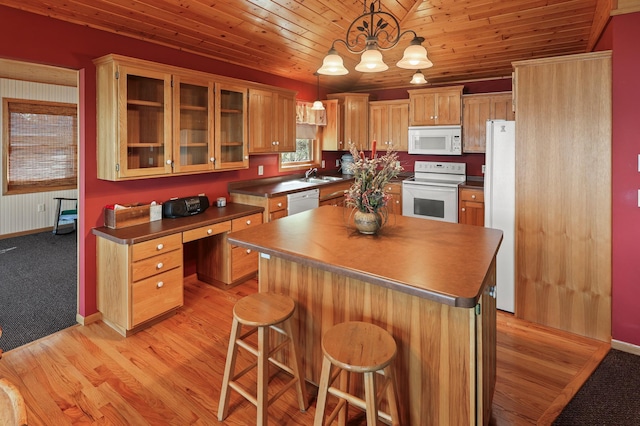 10209 Amery Ave NW, Silver Creek Twp, MN 55362 - kitchen featuring white appliances, dark countertops, a center island, wood ceiling, and glass insert cabinets