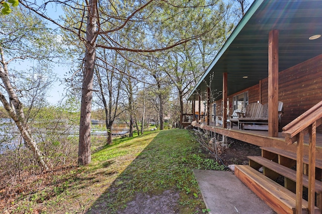 10209 Amery Ave NW, Silver Creek Twp, MN 55362 - view of green lawn featuring a water view