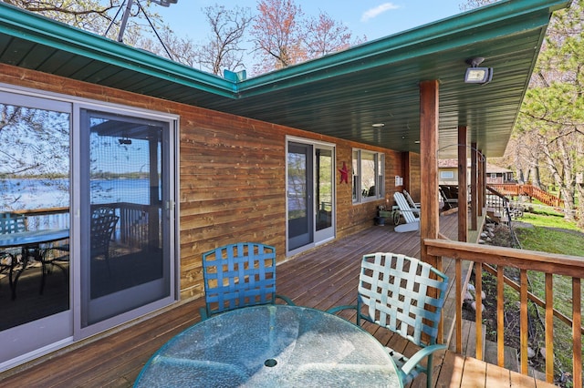 10209 Amery Ave NW, Silver Creek Twp, MN 55362 - wooden deck featuring outdoor dining space