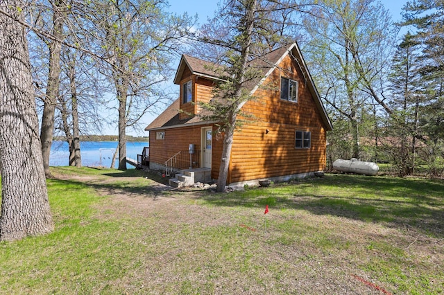 10209 Amery Ave NW, Silver Creek Twp, MN 55362 - view of side of home with a water view and a lawn