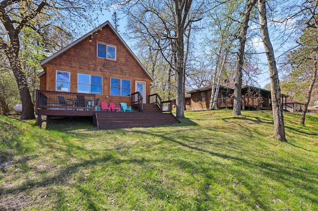 10209 Amery Ave NW, Silver Creek Twp, MN 55362 - back of house featuring a wooden deck and a lawn