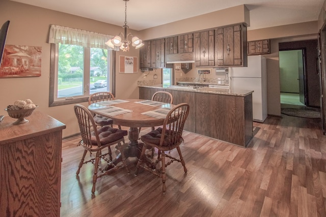 10929 108th Ave N, Maple Grove, MN 55369 - dining space with wood finished floors and a chandelier