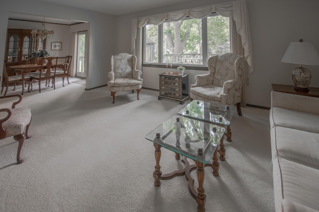 10929 108th Ave N, Maple Grove, MN 55369 - living area featuring carpet and a chandelier