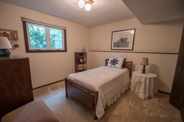 10929 108th Ave N, Maple Grove, MN 55369 - carpeted bedroom with baseboards and a textured ceiling