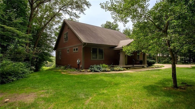 view of property exterior featuring a yard